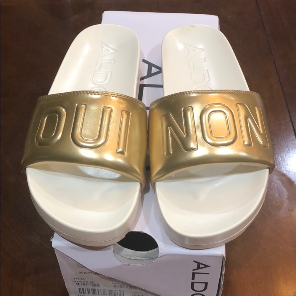 White & Gold “Oui Non” Kaylah Model Aldo Sandals